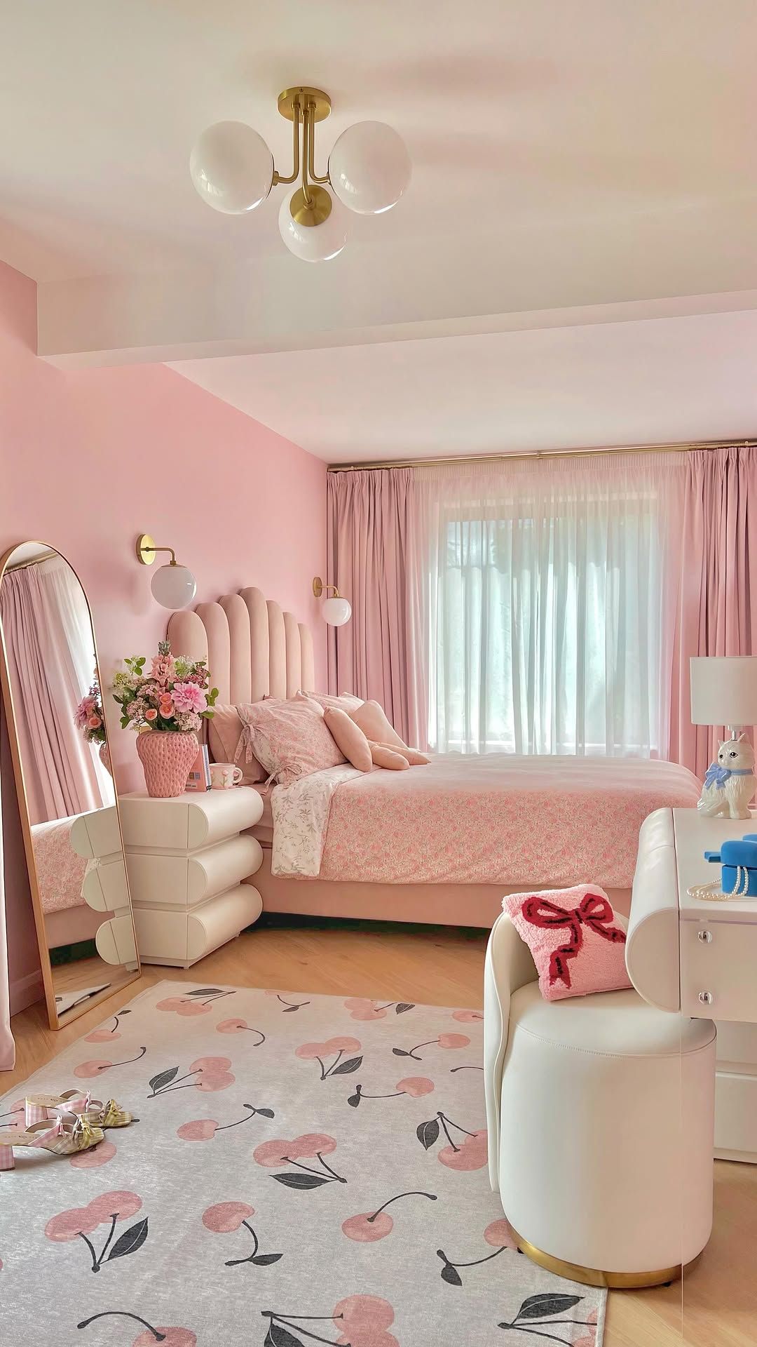 Curved Upholstery and Cherry Patterns Pushed Pink Into Modern Glam